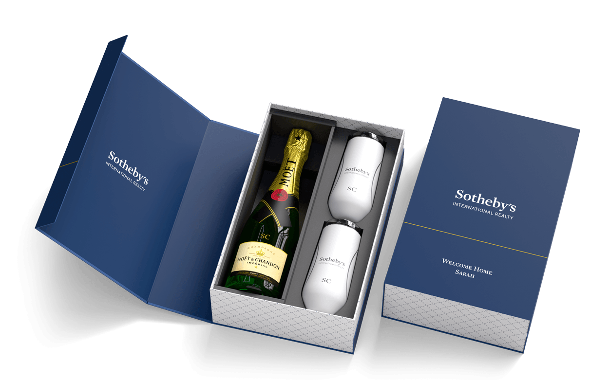 Insulated champagne flutes with a bottle of champagne and custom gift box